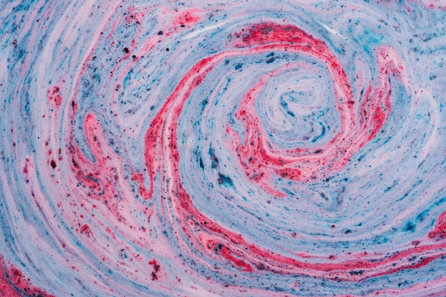 Textura de remolinos de bomba de baño azul y rosa