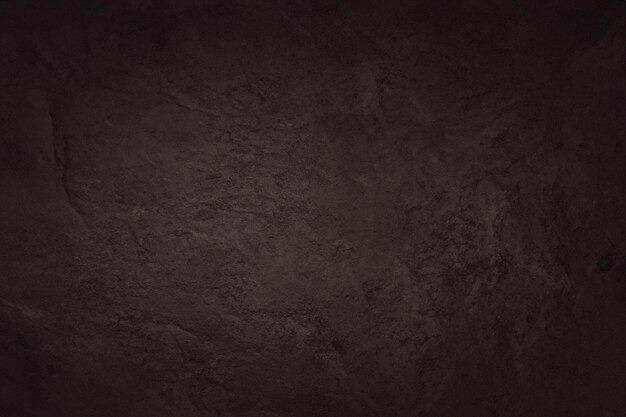 Foto textura de roca de pizarra marrón oscuro con fondo de alta resolución de pared de piedra natural