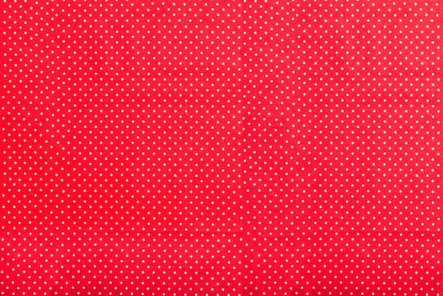 Foto textura roja con puntos blancos