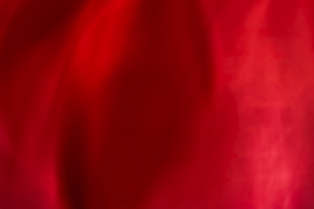 Textura de seda de fondo de arte abstracto rojo y líneas de onda en movimiento para un diseño de lujo clásico