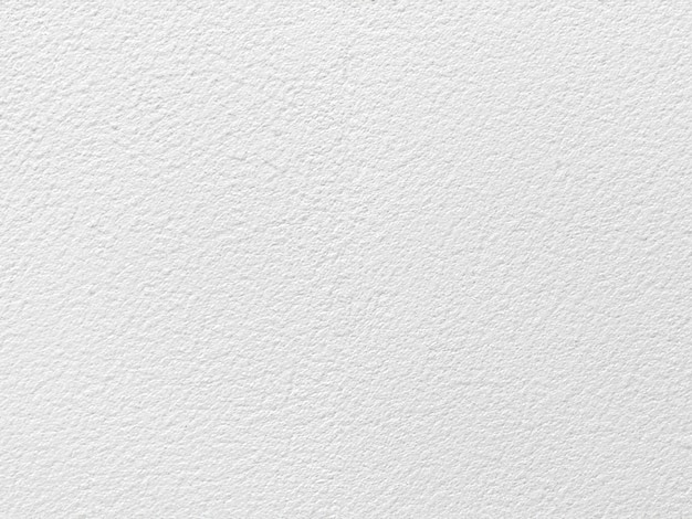 Textura sem costura de parede de cimento branco uma superfície áspera com espaço para texto para um fundo