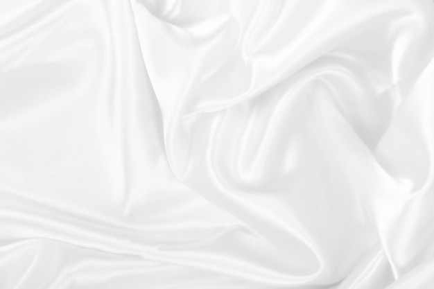 Foto textura suave e elegante de tecido branco, seda, fundo macio