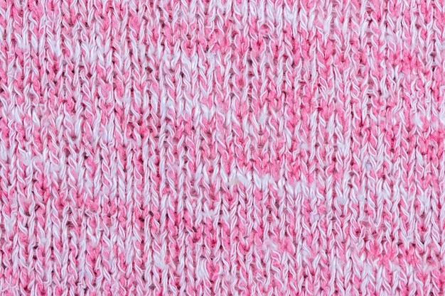 Textura de suéter rosa tejido