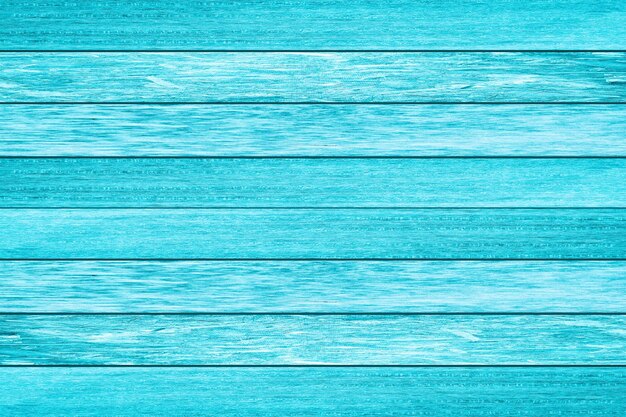 Foto la textura de la tabla de madera de color azul claro es de fondo de madera de playa vintage