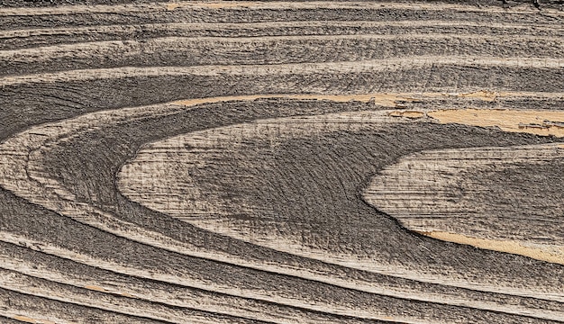 Textura de tablero de madera marrón con elementos de círculo natural.