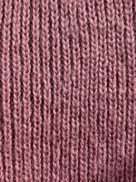 Textura tejida de hilo de lana rosa con mohair Primer plano de fondo abstracto