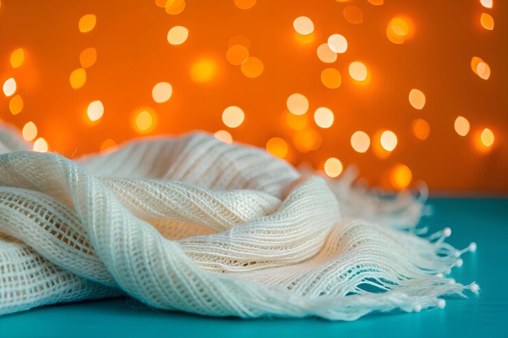 Una textura tejida que imita sutilmente una tela tejida a mano luces bokeh pastel flotan a través de la superficie