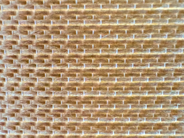 Foto textura tejida tejida de color beige de cerca
