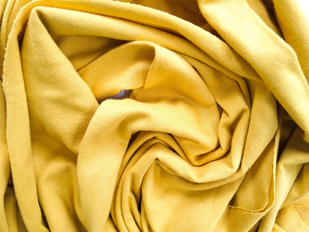 Foto textura de tela de algodón amarillo