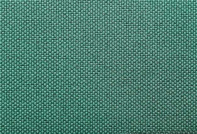 Textura de tela de algodón verde como primer plano de fondo