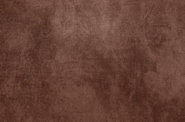 Textura de tela aterciopelada con detalles angustiados en el color Pantone 2025 Mocha Mousse