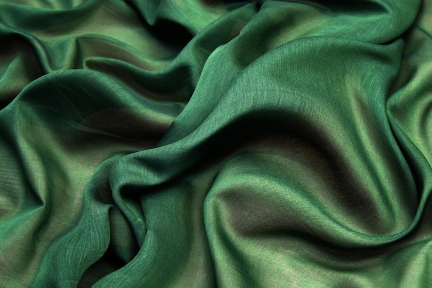 Textura de la tela de géneros de punto verde, patrón