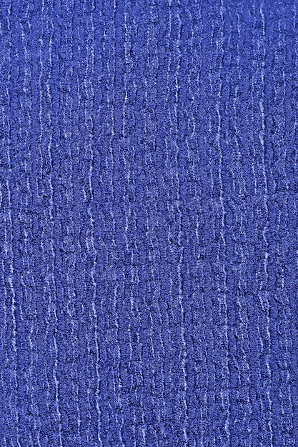 La textura de la tela de patrón azul es un fondo de madera brillante de moda minimalista.