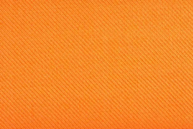 Textura de tela para tapicería de muebles Tela resistente al desgaste para muebles Textura de tela naranja cerca de la vista superior