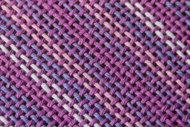 Foto textura de la tela tejida con colores ultravioleta y lila