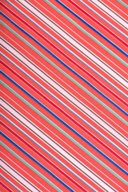 Textura de tela de tela a rayas de camisa de algodón rosa blanco azul para el patrón textil natural de fondo