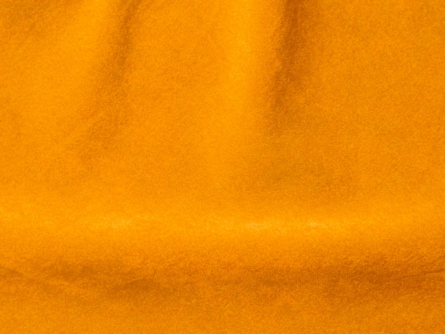 Textura de tela de terciopelo amarillo utilizada como fondo Fondo de tela amarilla vacía de material textil suave y liso Hay espacio para textx9