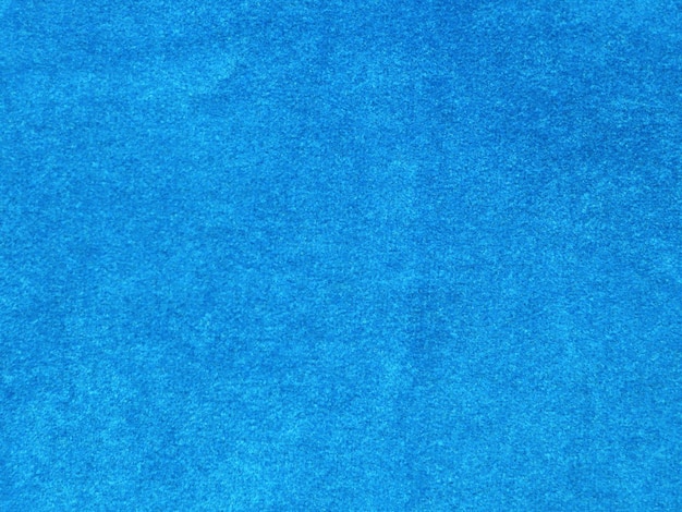 Textura de tela de terciopelo azul claro utilizada como fondo Fondo de tela azul claro vacío de material textil suave y liso Hay espacio para texto
