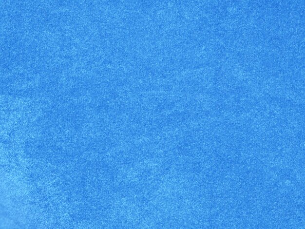 Textura de tela de terciopelo azul claro utilizada como fondo Fondo de tela azul claro vacío de material textil suave y liso Hay espacio para texto