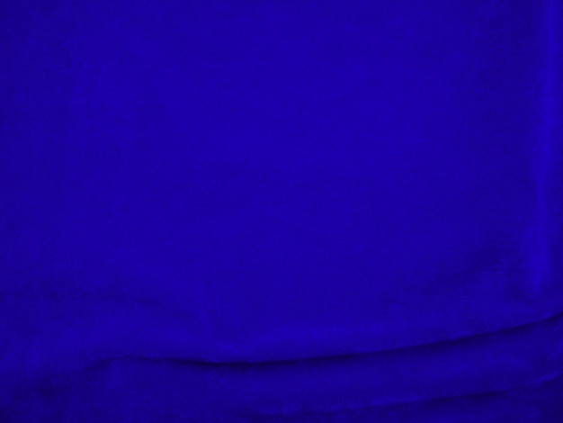 Textura de tela de terciopelo azul oscuro utilizada como fondo Fondo de tela de panne de color cielo de material textil suave y liso terciopelo triturado tono cobalto de lujo para seda