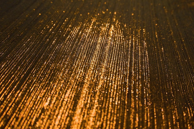 Textura de tela de terciopelo de color dorado utilizada como fondo Fondo de tela dorada vacía de material textil suave y liso Hay espacio para textx9