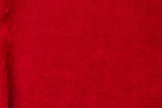 Textura de tela de terciopelo rojo utilizada como fondo fondo de tela roja de material textil suave y liso Hay espacio para textx9