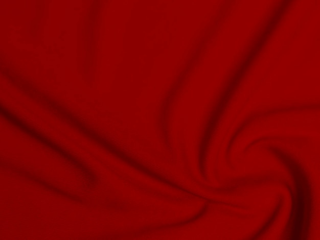 Textura de tela de terciopelo rojo utilizada como fondo Fondo de tela roja vacía de material textil suave y liso Hay espacio para texto