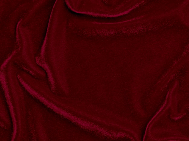 Foto textura de tela de terciopelo rojo utilizada como fondo fondo de tela roja vacía de material textil suave y liso hay espacio para textx9