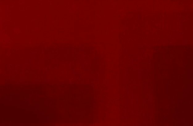 Foto textura de tela de terciopelo rojo utilizada como fondo de tela de panne rojo de material textil suave y liso escarlata de lujo de terciopelo triturado para seda