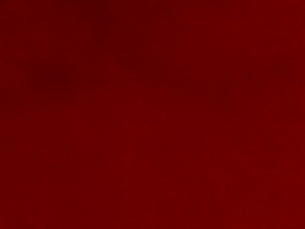 Textura de tela de terciopelo rojo utilizada como fondo de tela de panne rojo de material textil suave y liso escarlata de lujo de terciopelo triturado para seda