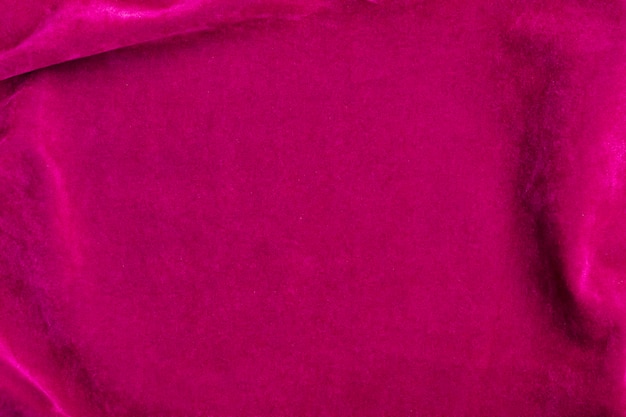 Textura de tela de terciopelo rosa utilizada como fondo fondo de tela rosa de material textil suave y liso Hay espacio para textx9