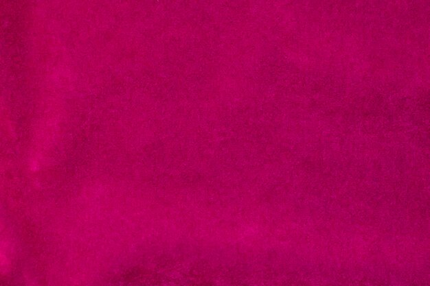 Foto textura de tela de terciopelo rosa utilizada como fondo fondo de tela rosa de material textil suave y liso hay espacio para textx9