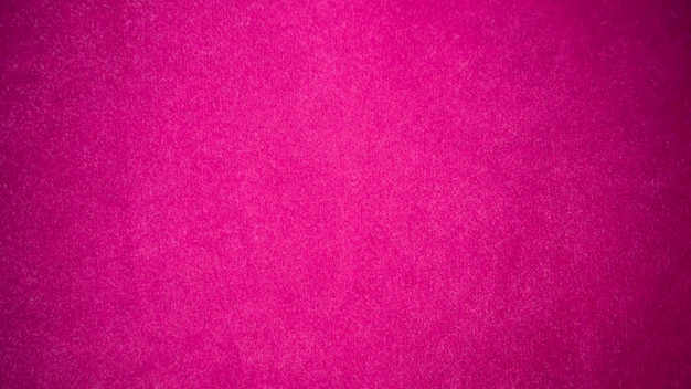 Textura de tela de terciopelo rosa utilizada como fondo Fondo de tela rosa vacío de material textil suave y liso Hay espacio para texto