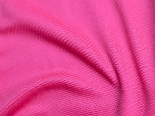 Textura de tela de terciopelo rosa utilizada como fondo Fondo de tela rosa vacío de material textil suave y liso Hay espacio para textxD