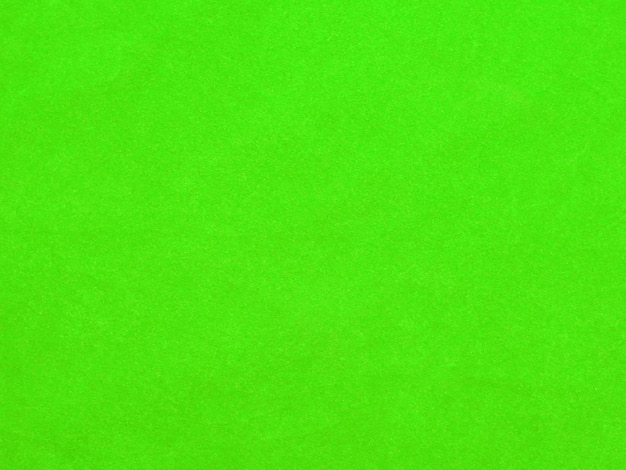 Textura de tela de terciopelo verde claro utilizada como fondo Fondo de tela verde vacío de material textil suave y liso Hay espacio para texto