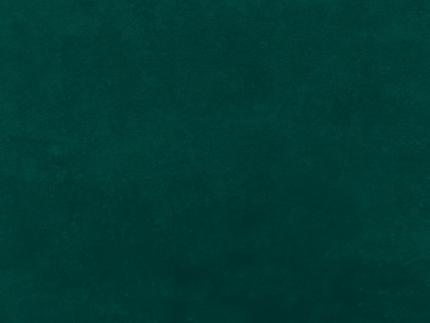 Textura de tela de terciopelo viejo verde oscuro utilizada como fondo Fondo de tela verde vacío de material textil suave y liso Hay espacio para textx9
