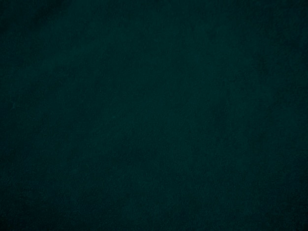 Textura de tela de terciopelo viejo verde oscuro utilizada como fondo Fondo de tela verde vacío de material textil suave y liso Hay espacio para textx9