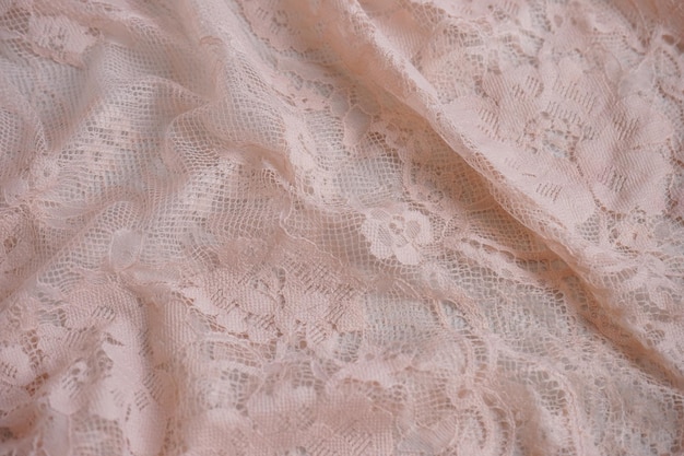 Textura de tela de tulle de encaje rosa con patrón floral Estilo de colocación plana sesión de fotos de estudio de primer plano