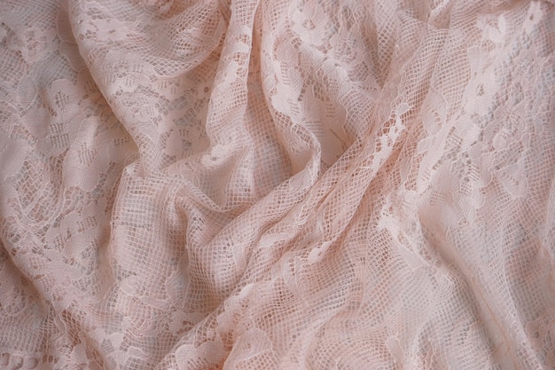 Textura de tela de tulle de encaje rosa con patrón floral Estilo de colocación plana sesión de fotos de estudio de primer plano