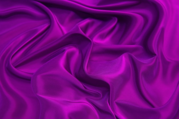 Textura de tela violeta o púrpura ondulada elegante suave hermosa, fondo abstracto para el diseño.