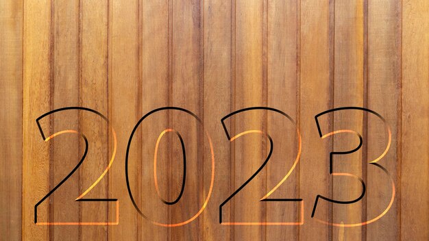 Textura de tira de madera con año nuevo tallado 2023