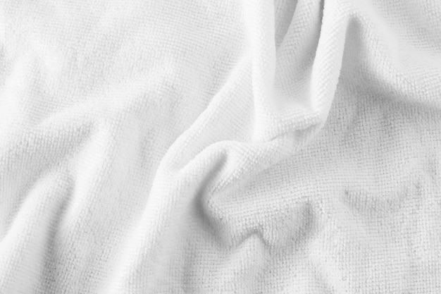 textura de toalla blanca sobre un fondo blanco