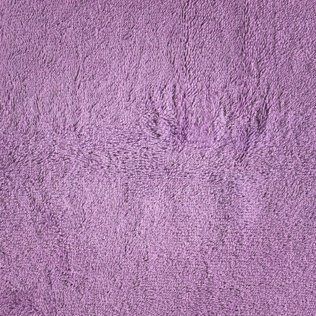 Textura de toalla de fibras violetas Fondo de toalla de baño violeta