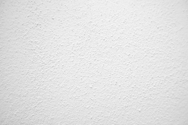 Textura transparente de pared de cemento blanco una superficie rugosa con espacio para texto de fondo