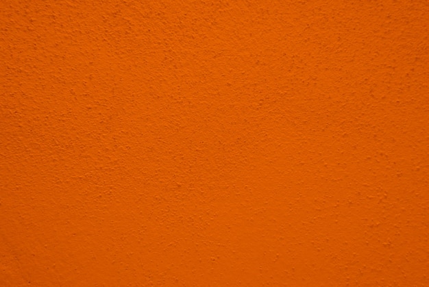 Foto textura transparente de pared de cemento naranja una superficie rugosa con espacio para texto para un fondox9