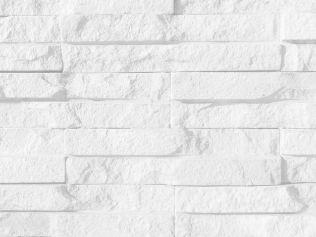 Textura transparente de pared de piedra de ladrillo gris blanco una superficie rugosa con espacio para texto para un fondox9