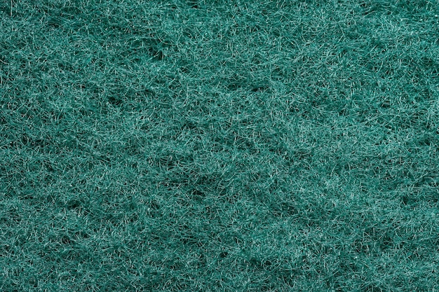 Textura verde da superfície da esponja de espuma