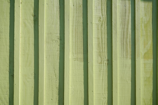 Textura verde de madeira do fundo horizontal da prancha de madeira