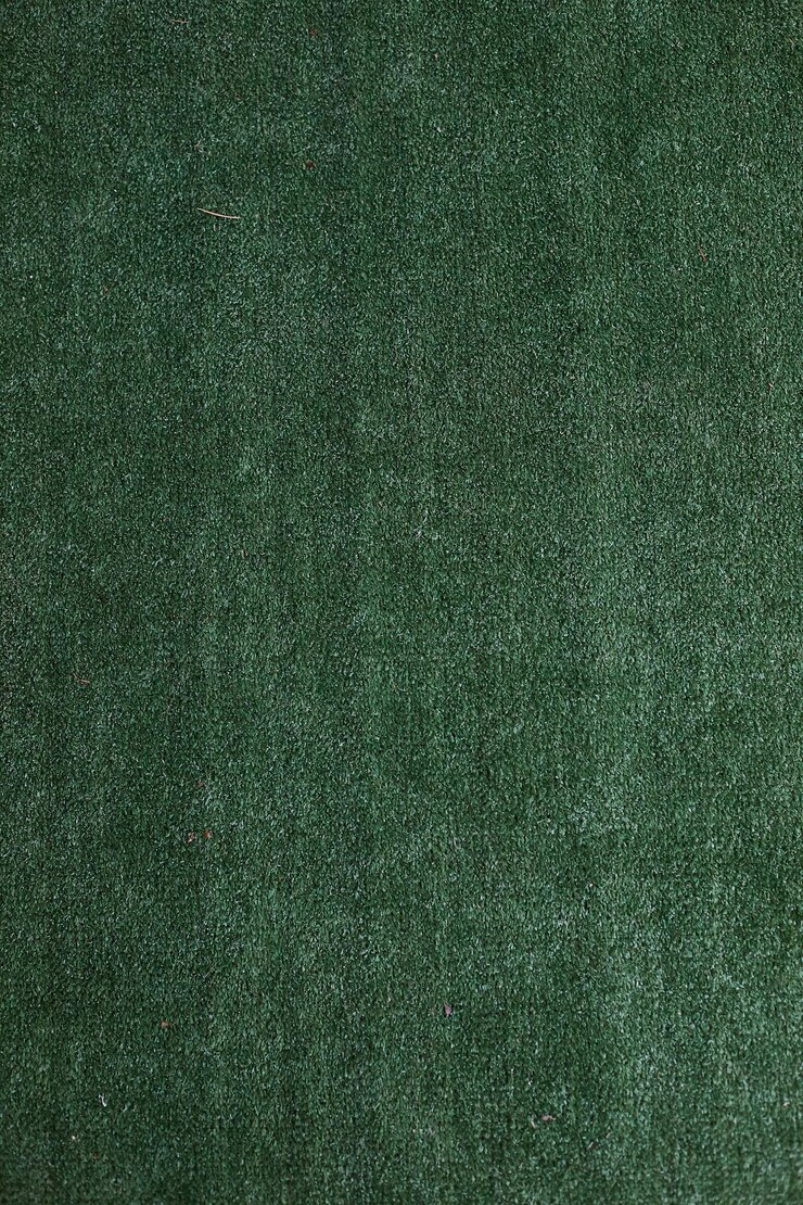 Foto textura vertical de grama verde artificial