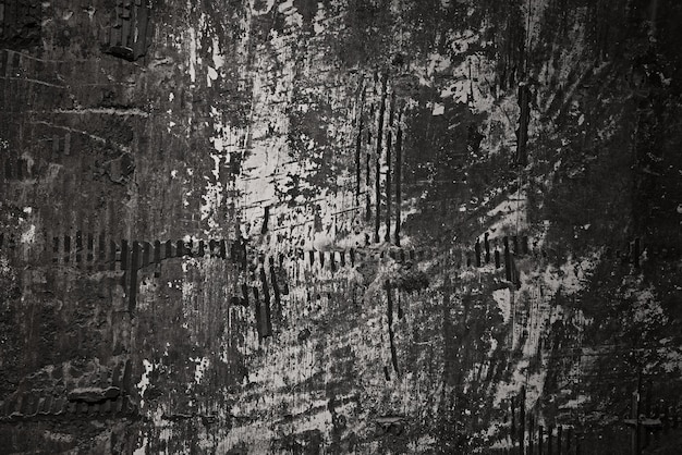 Textura de la vieja pared desgastada grunge áspera con arañazos en blanco y negro